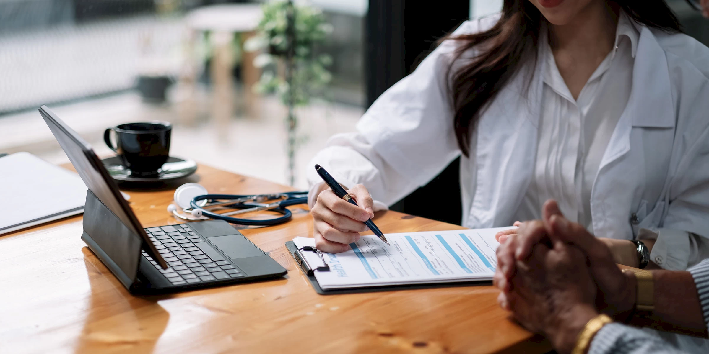 A doctor and patient in an office